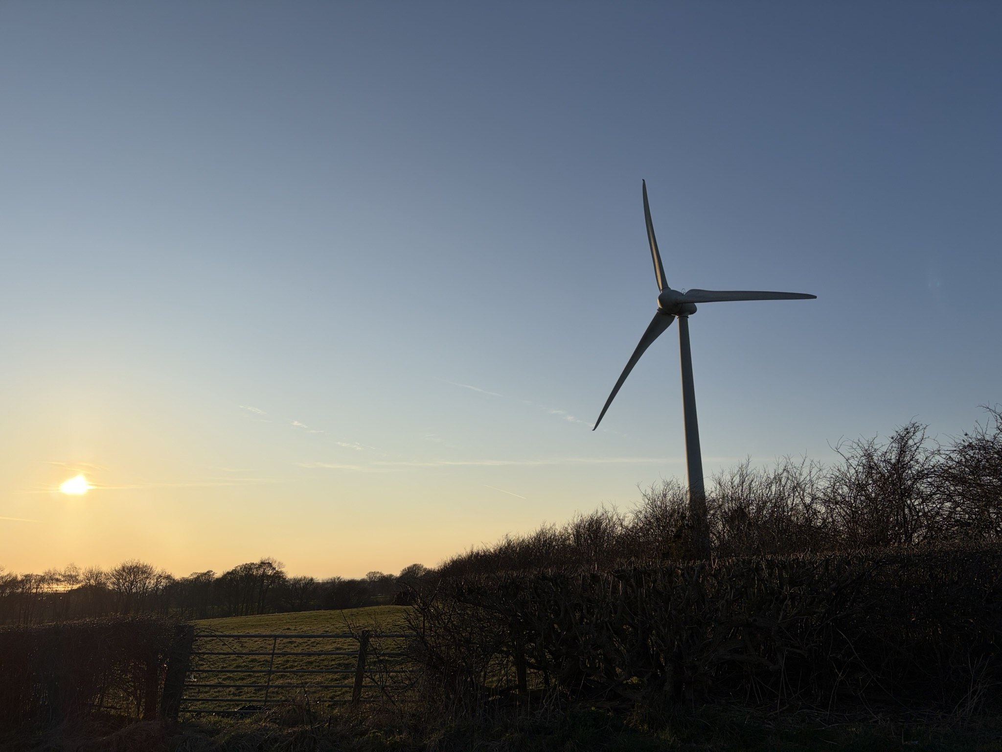 The Lancaster University wind turbine at sunset